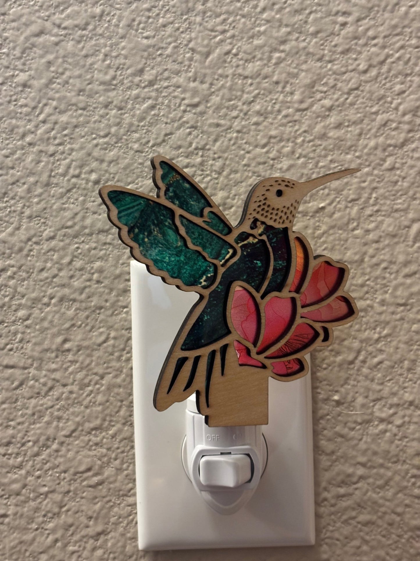 Hummingbird on Flower Nightlight in wood and acrylic with multicolor stained glass effect.