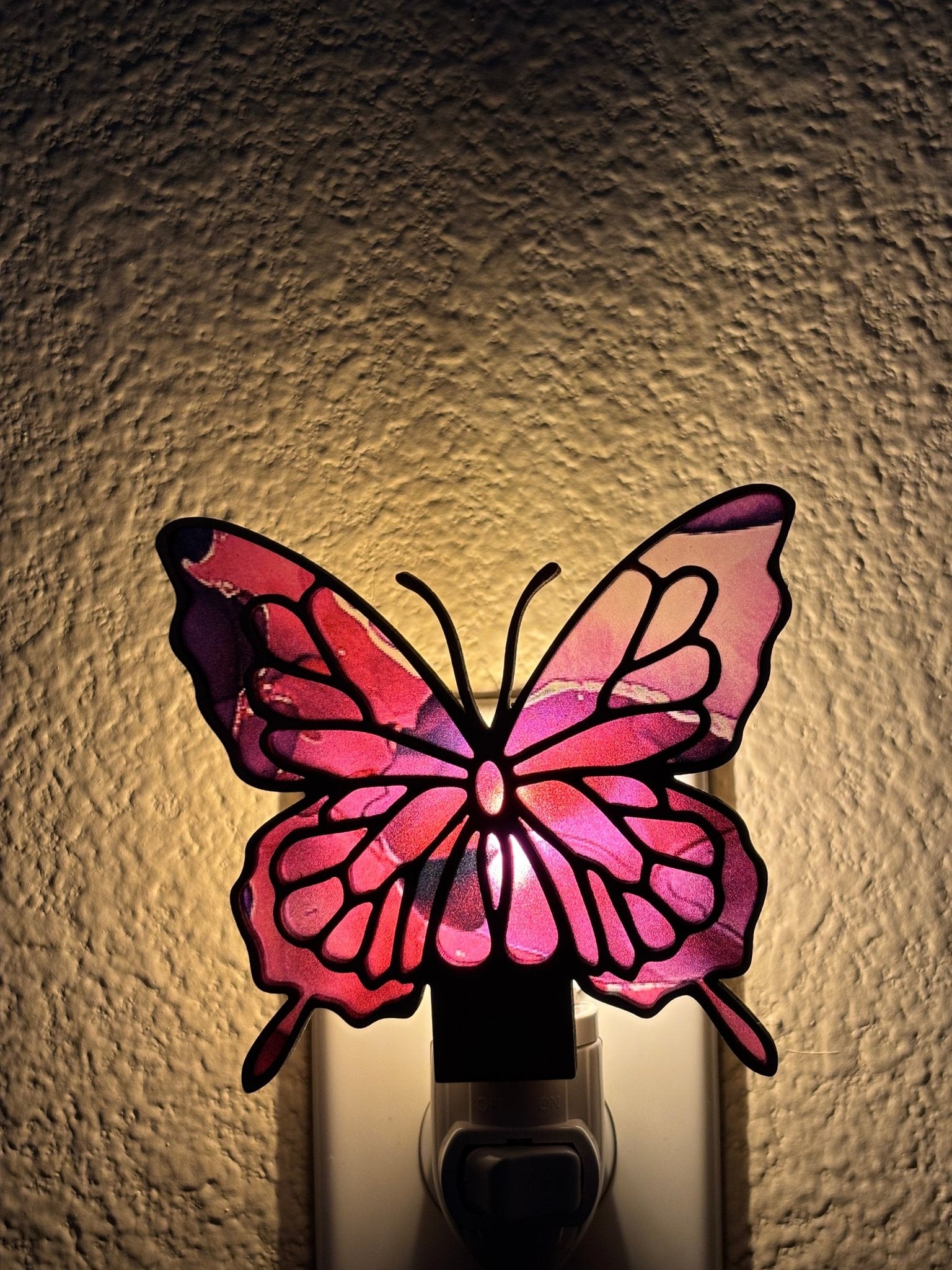 Butterfly stained glass effect nightlight with wood and acrylic, multicolor glow lighted.
