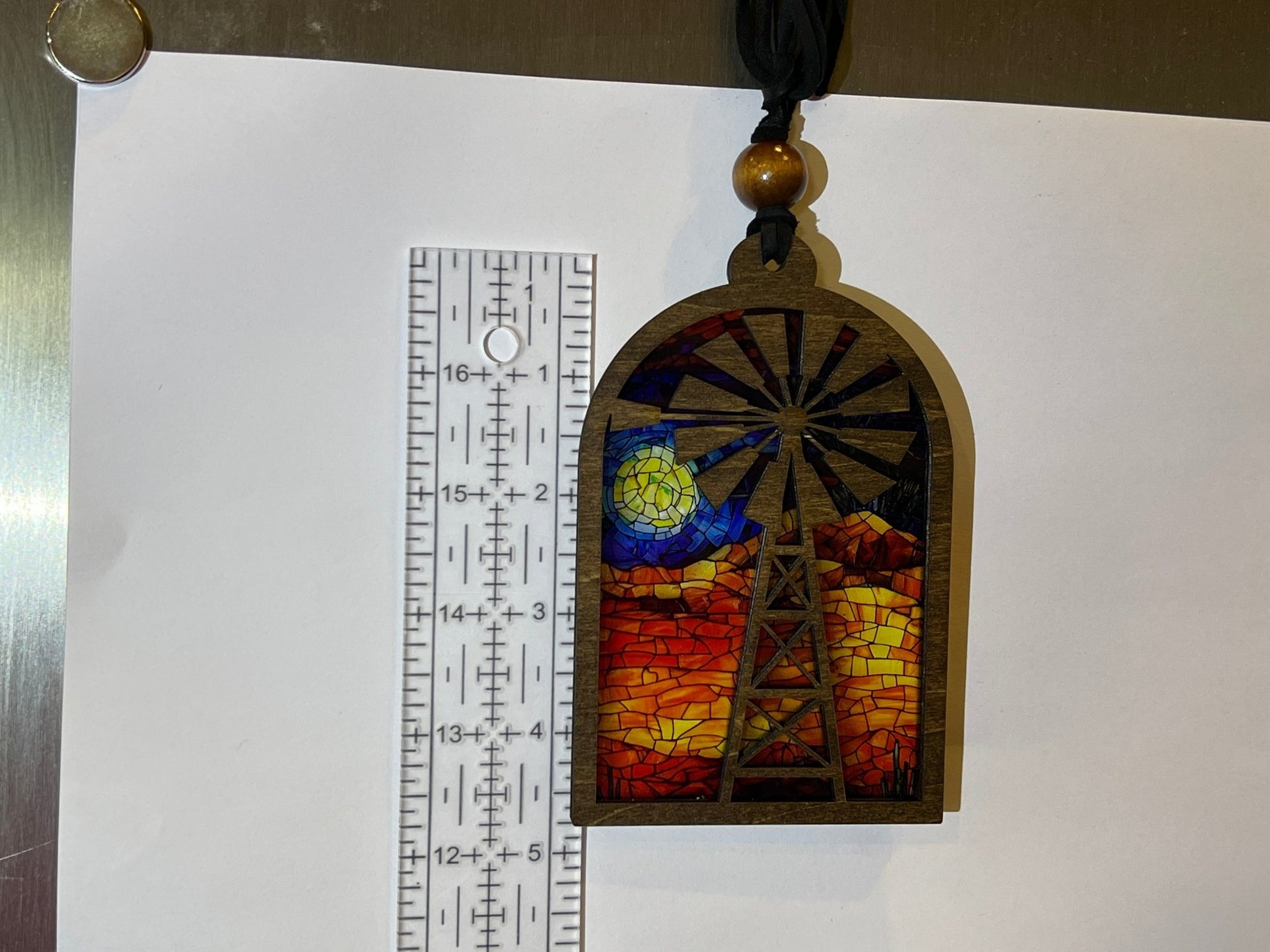 Windmill suncatcher with stained glass effect in wood and acrylic, multicolor.