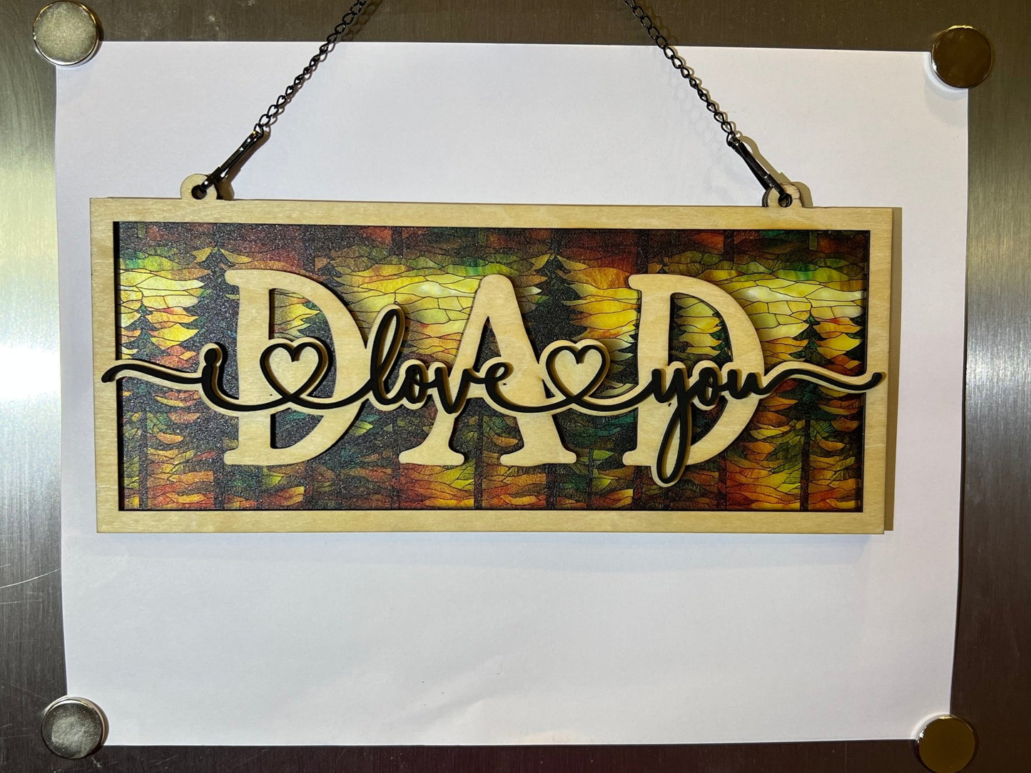 Handmade suncatcher with wood and acrylic in multicolor, perfect for decor.