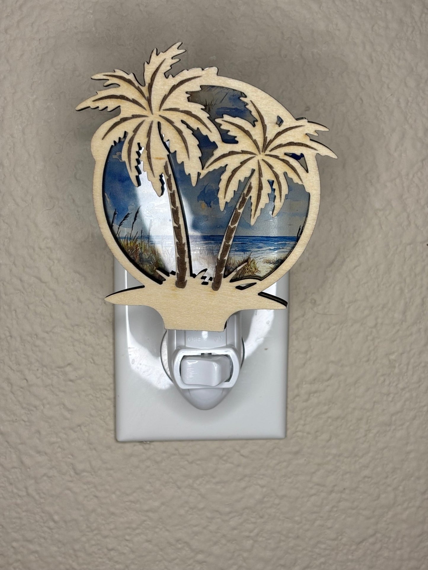 Palm Tree Nightlight with natural wood and multicolor acrylic in a stained glass effect.