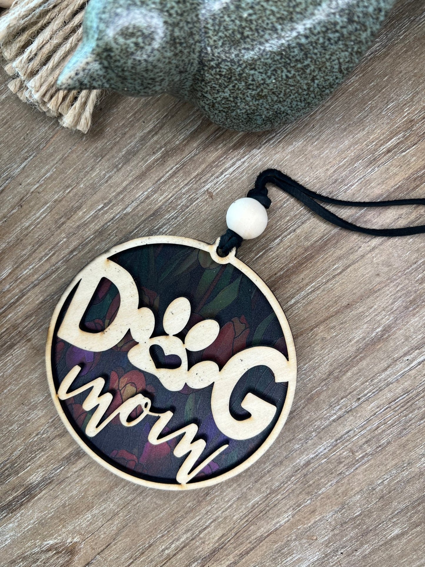 Handmade Dog Mom suncatcher with natural wood and multicolor acrylic offering a rustic stained glass effect.