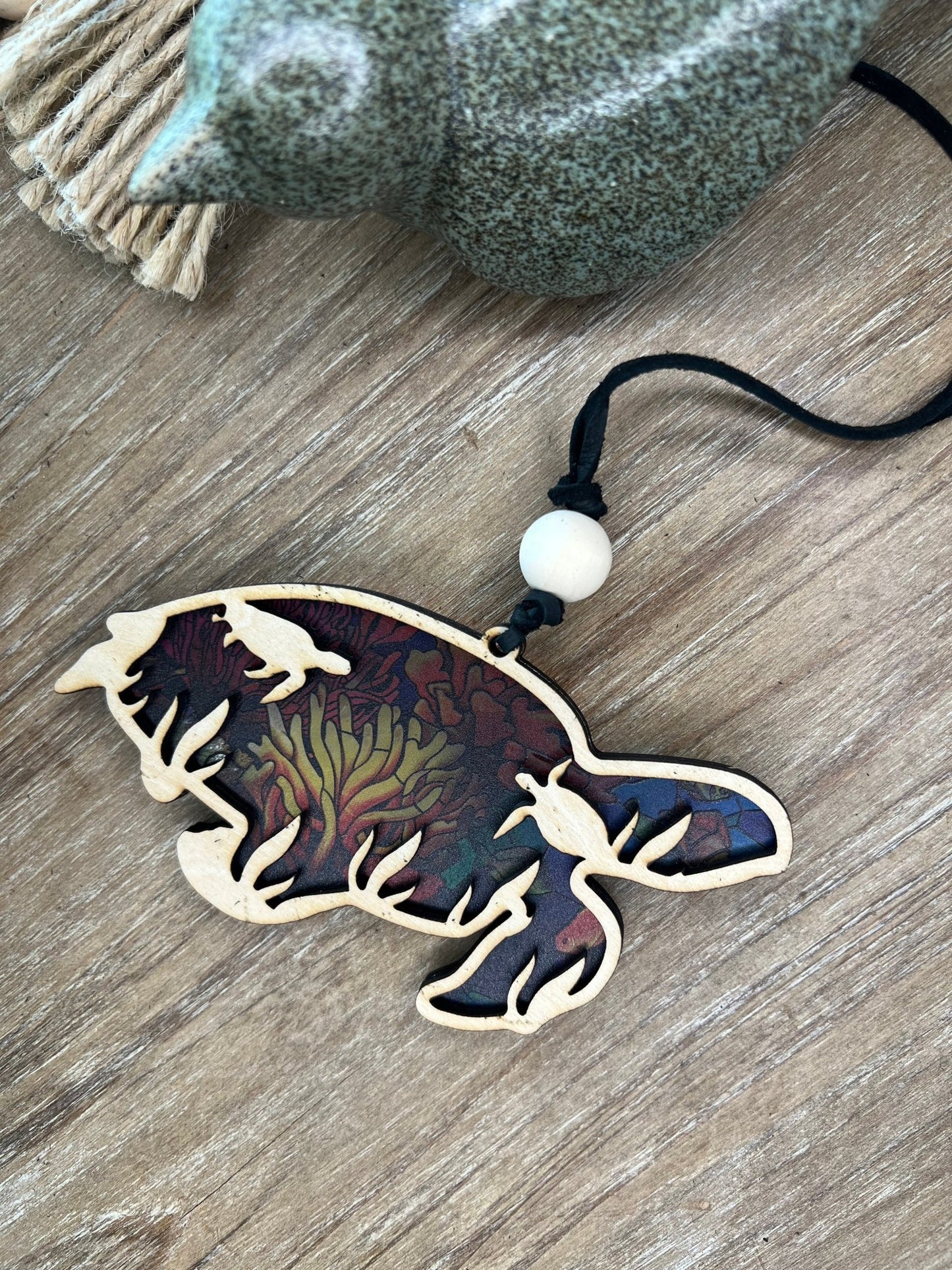 Sea turtle suncatcher with natural wood and multicolor acrylic, perfect for rustic and beach-themed decor.