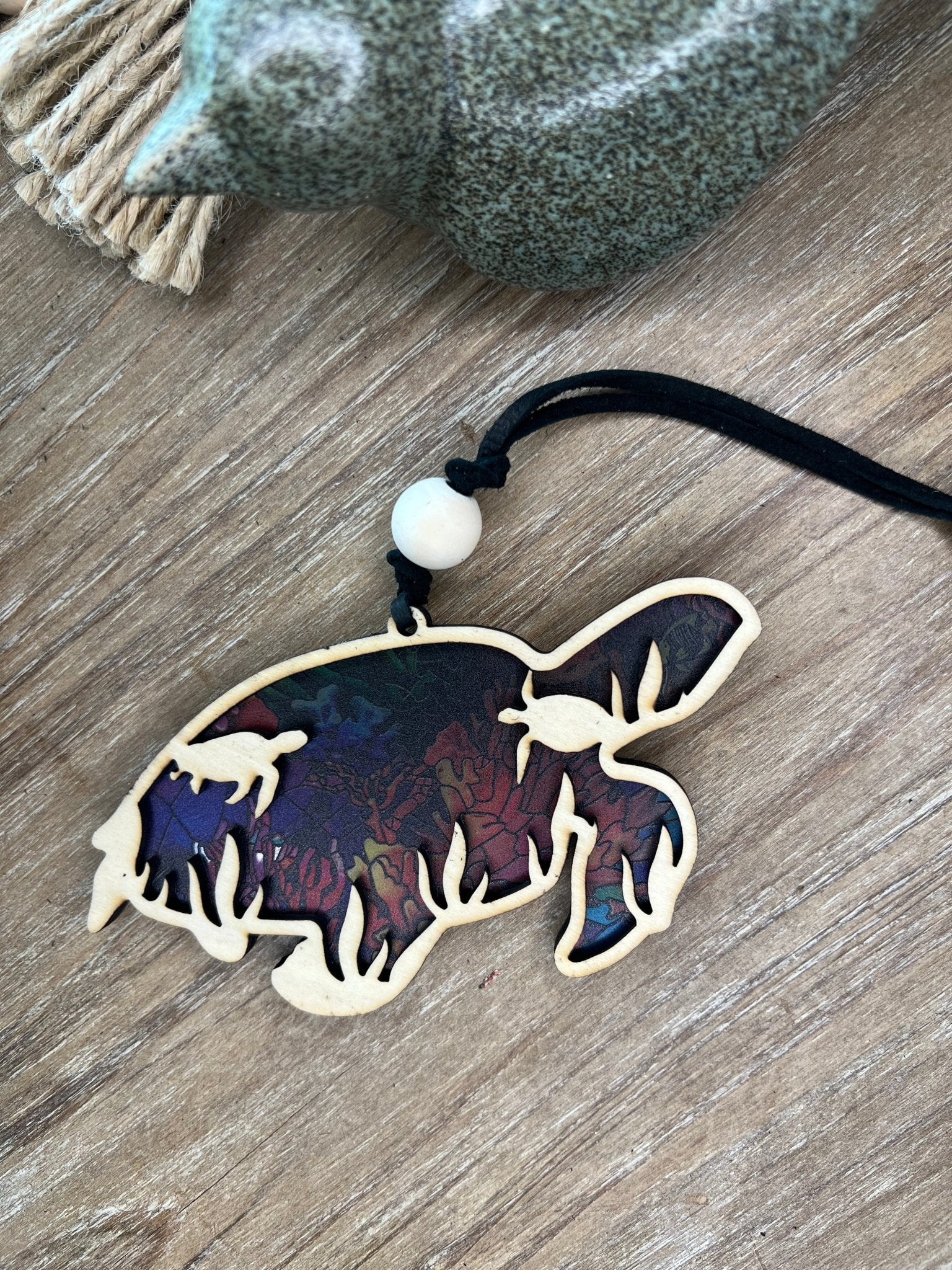 Sea Turtle suncatcher with stained glass effect, wooden and multicolored design.