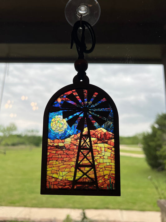 Windmill suncatcher with stained glass effect in wood and acrylic, multicolor in sunlight.