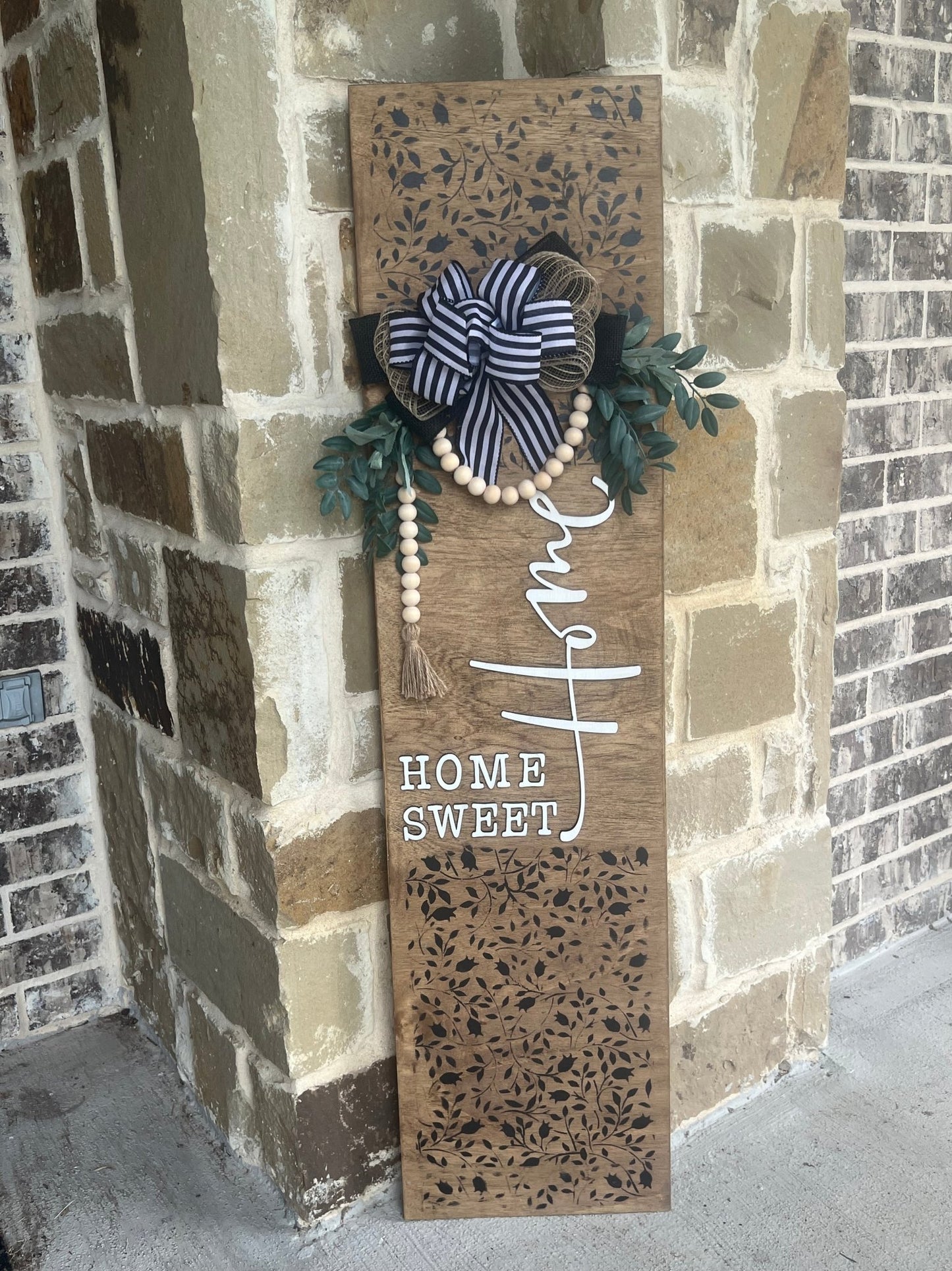 Mini Flower and Vine Home Sweet Home Door Lean, rustic wooden decor with black, white, and natural wood colors by garage.