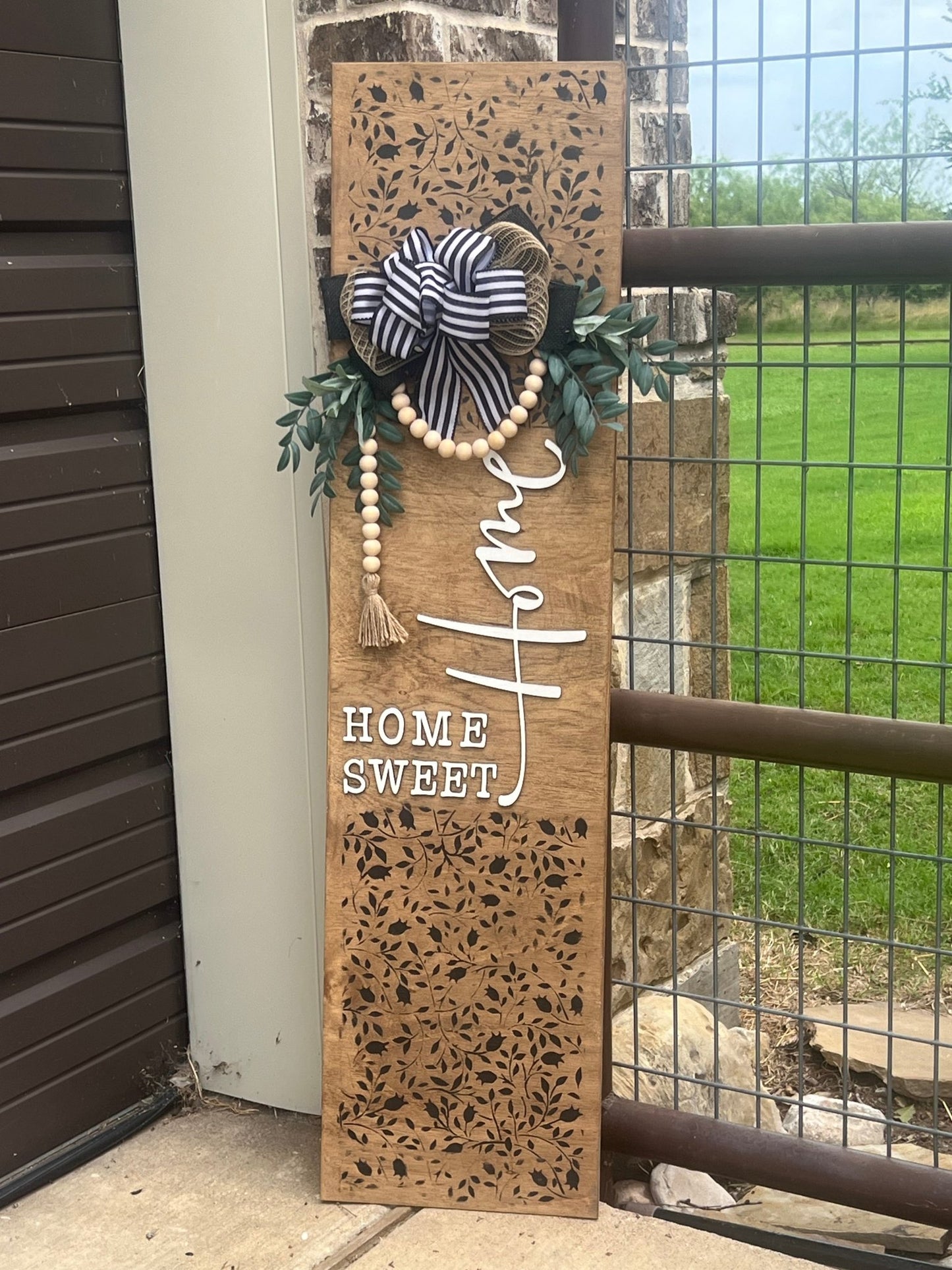 Mini Flower and Vine Home Sweet Home Door Lean, rustic wooden decor with black, white, and natural wood colors.