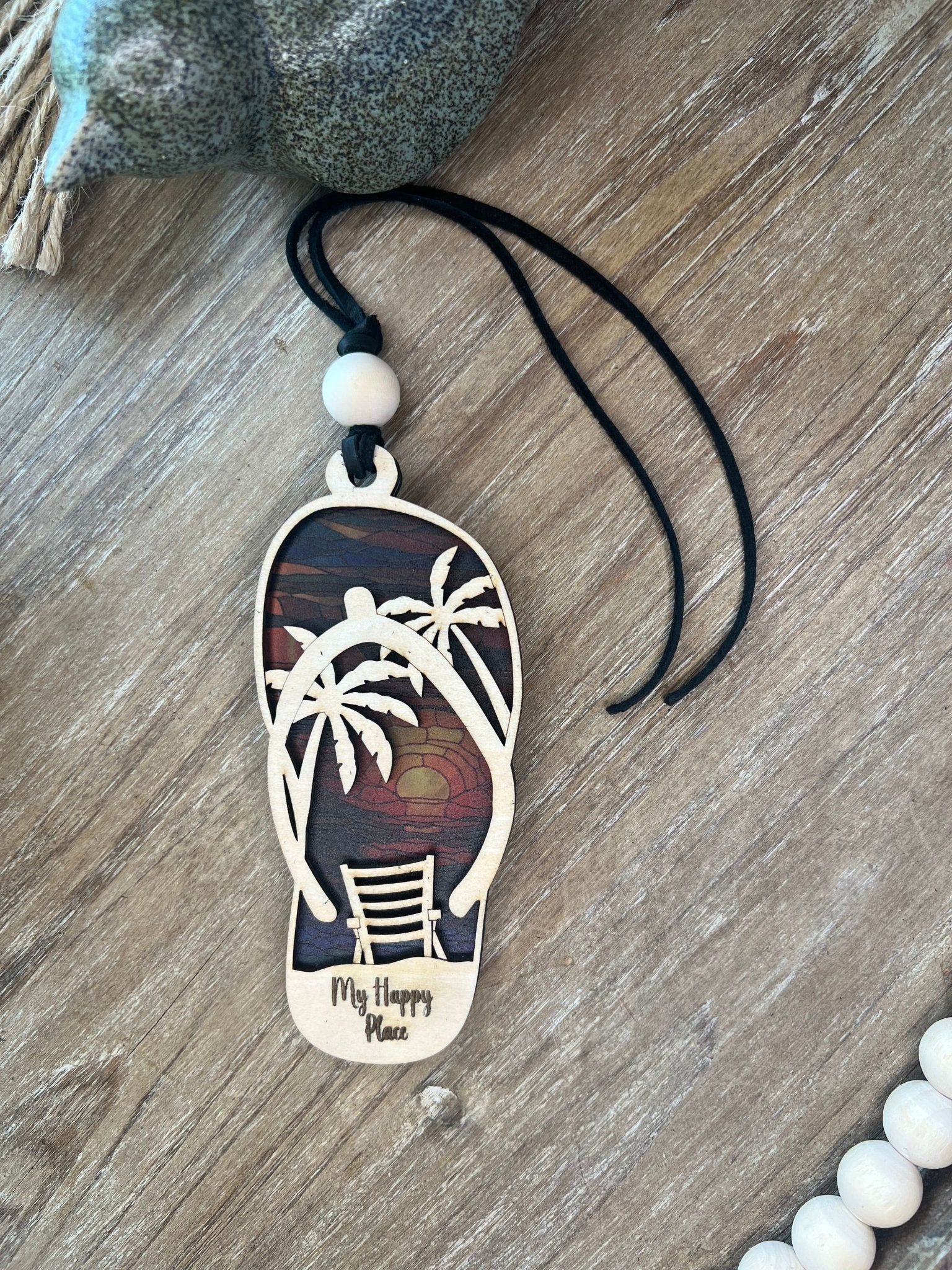 Flip Flop Sunrise Suncatcher featuring rustic wood and multicolor acrylic with a stained glass effect unlit.