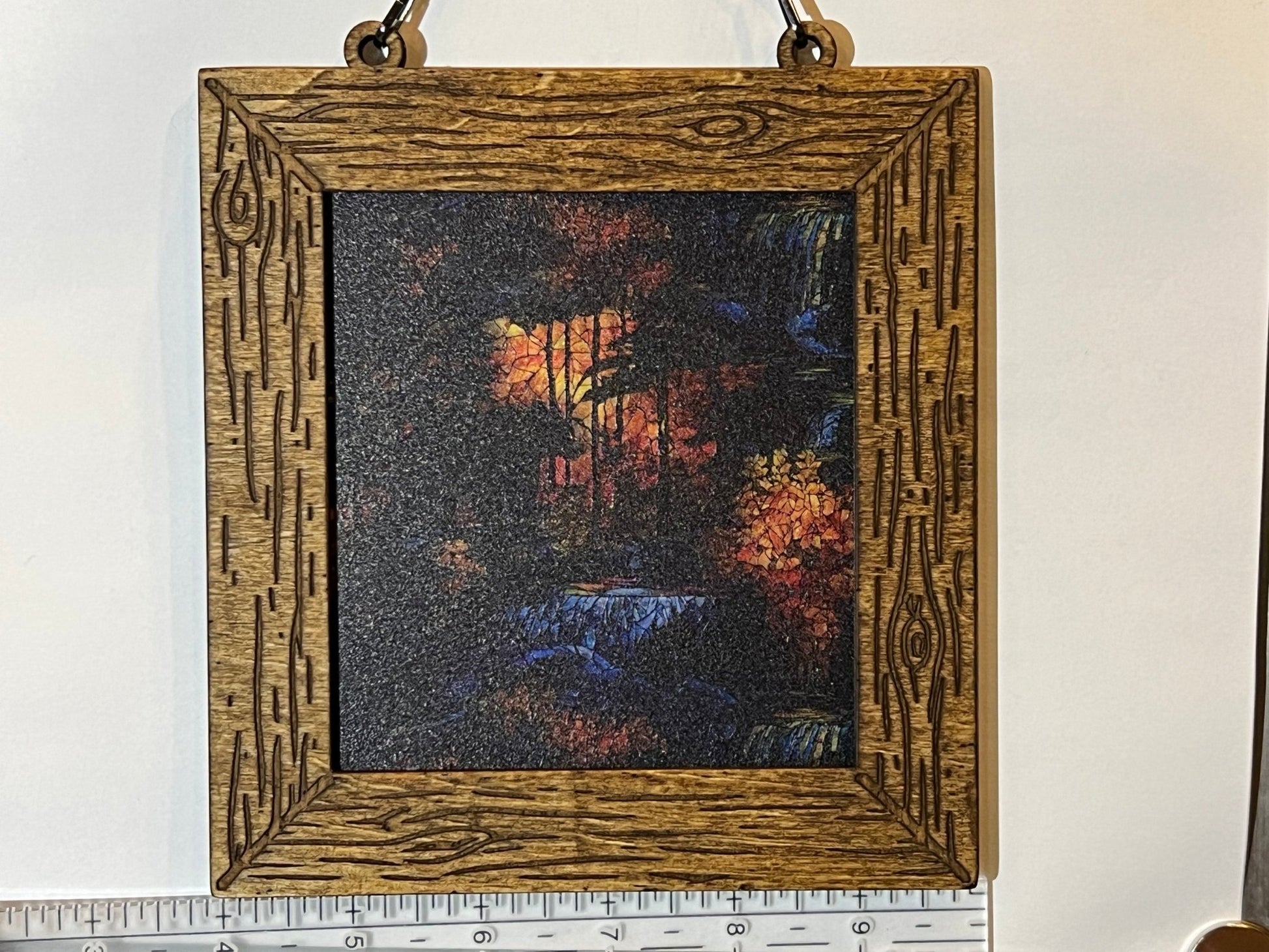 Bear in the Wilderness suncatcher featuring stained glass effect wood and acrylic in a 6-inch multicolor design with ruler.