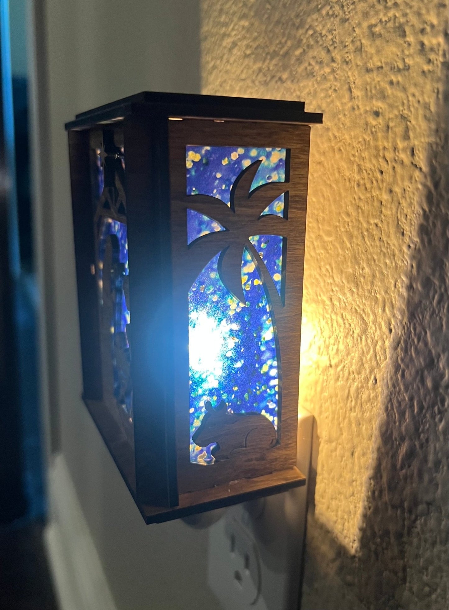 A Christmas Nativity Lantern Nightlight in golden oak with wood and acrylic materials - light left side view.
