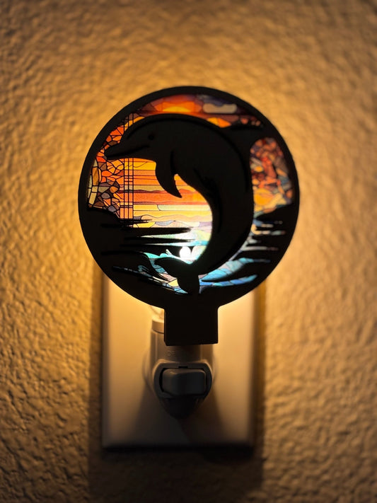 Dolphin nightlight in natural wood and multicolor acrylic, rustic decor with stained glass effect lit.