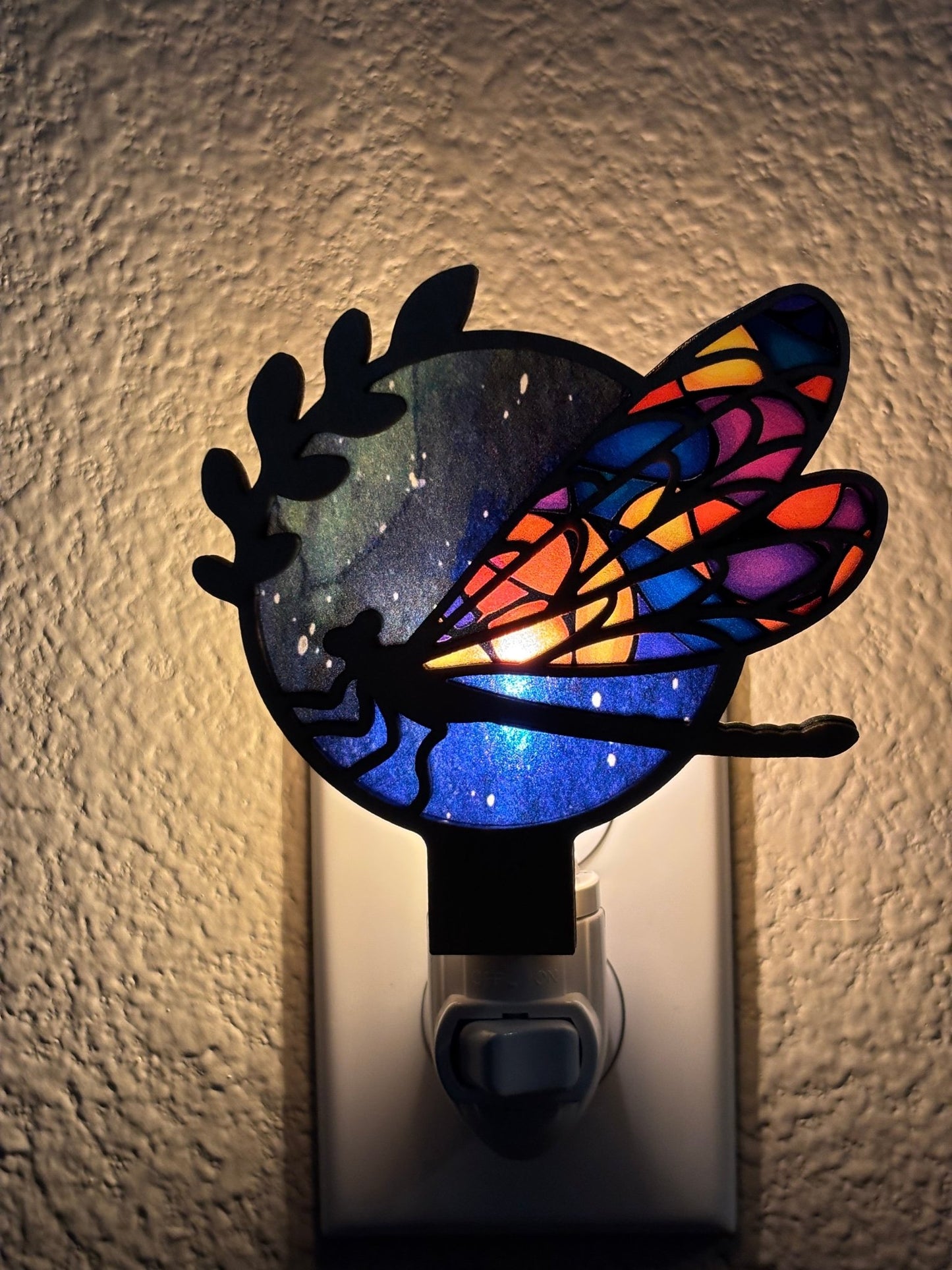 Rustic Dragon Fly nightlight with stained glass effect in wood and acrylic lighted.