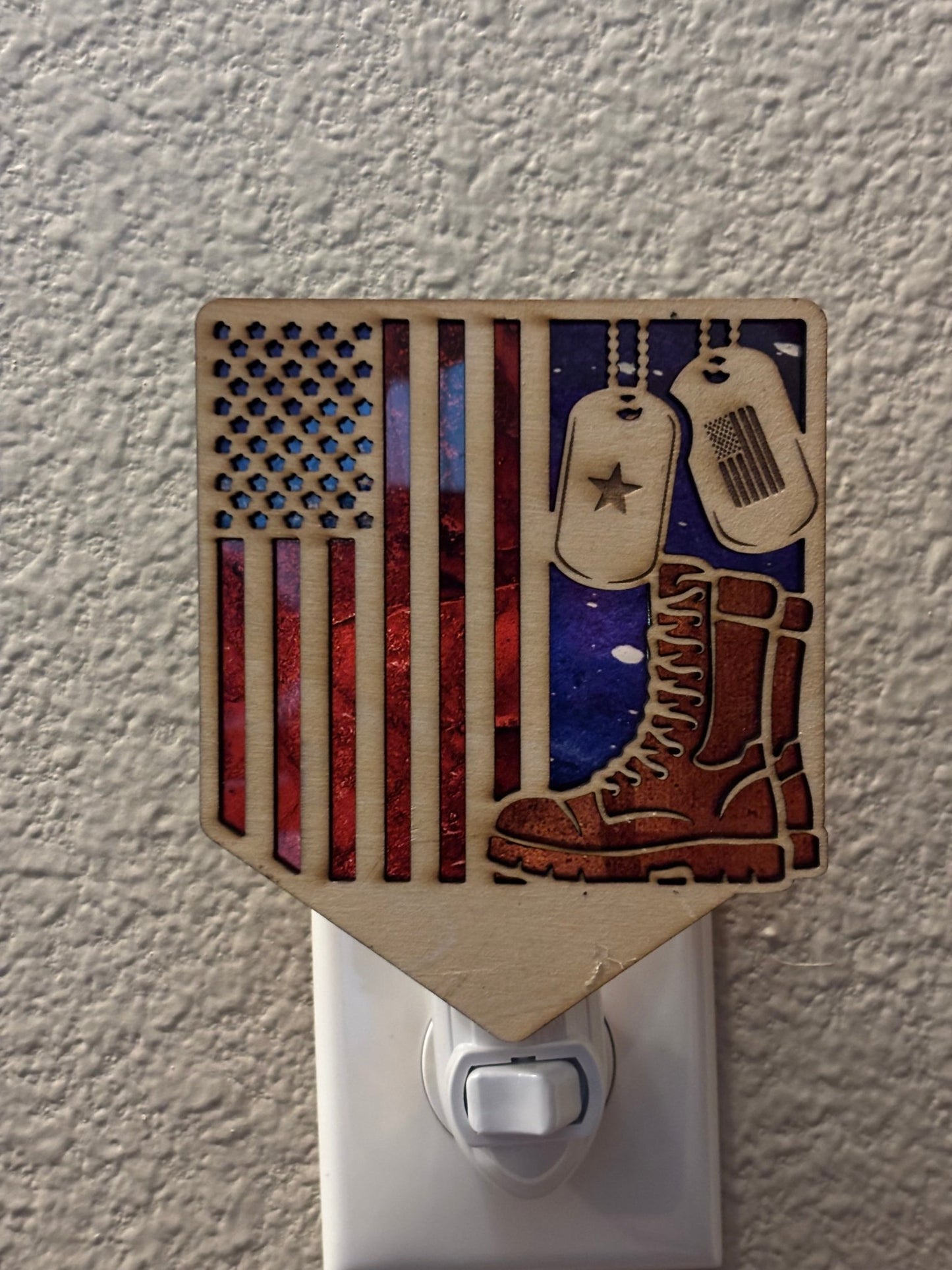 Stained glass effect nightlight with wood frame and multicolor acrylic honoring soldiers.