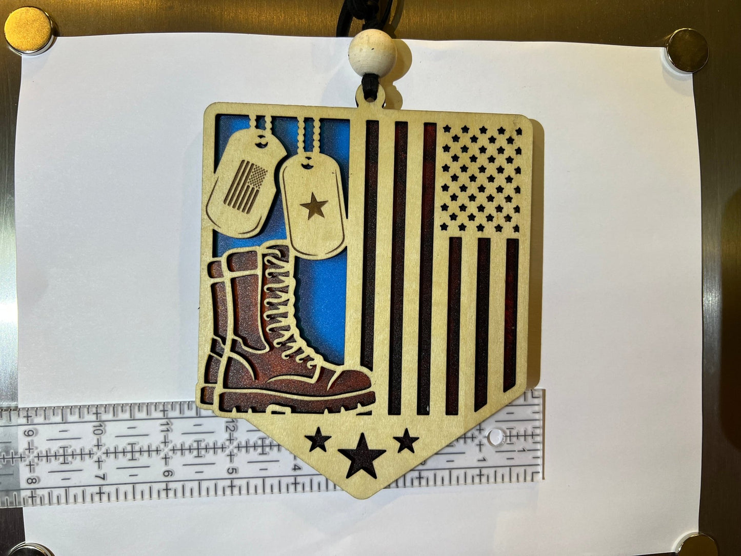 Multicolor stained glass effect suncatcher in wood and acrylic, honoring soldiers unit with verticle ruler.