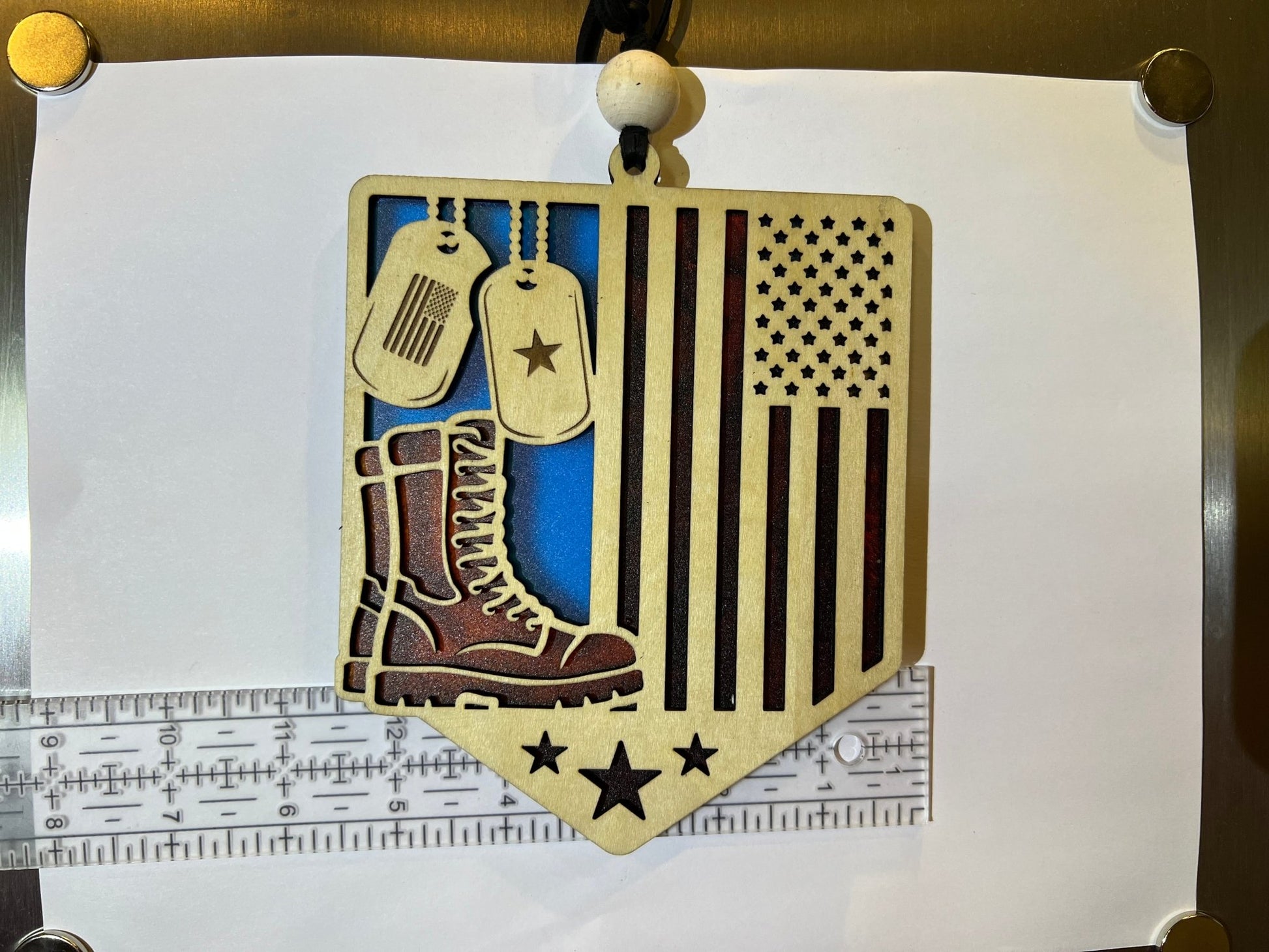 Multicolor stained glass effect suncatcher in wood and acrylic, honoring soldiers unit with verticle ruler.