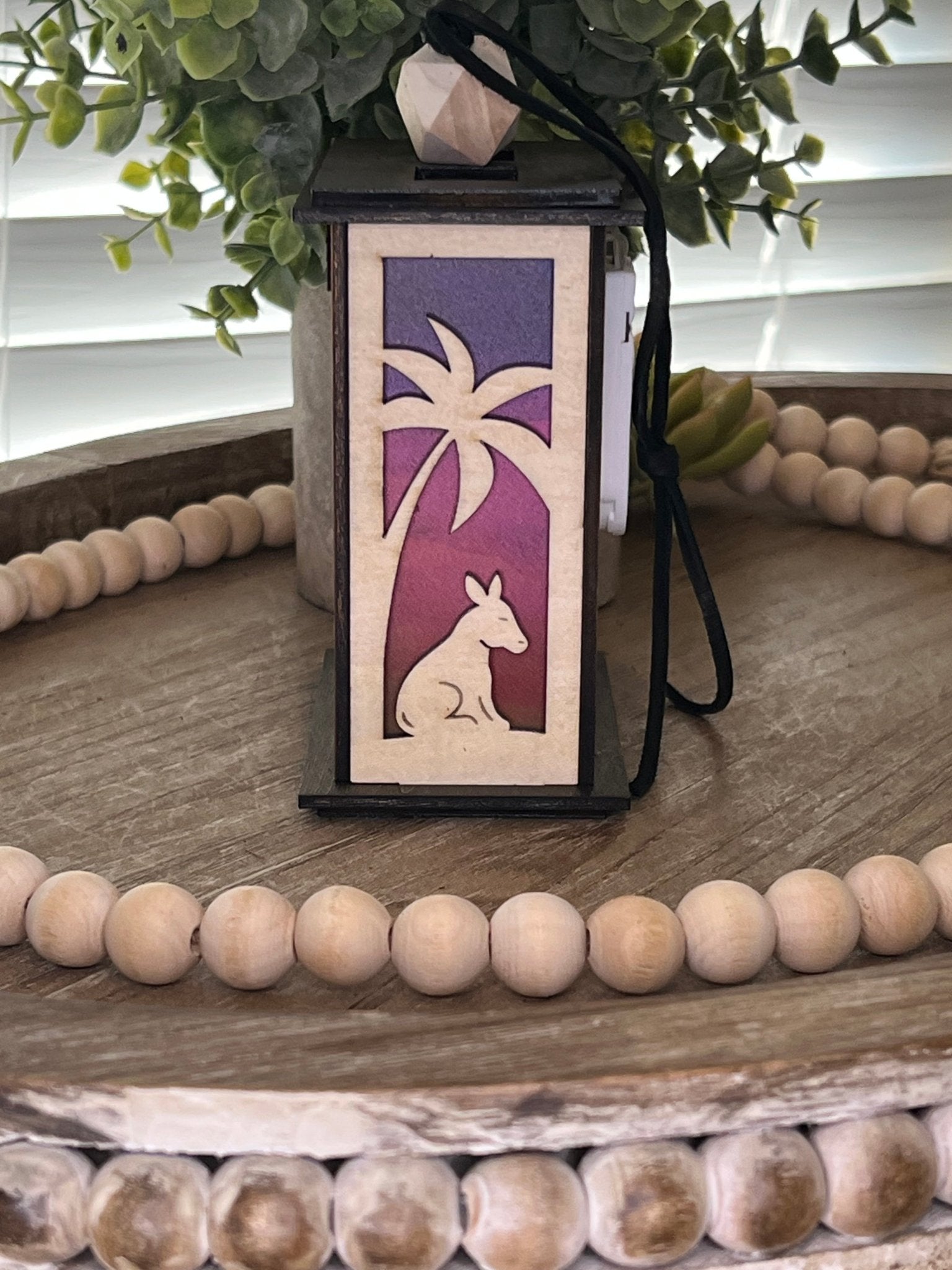 Lighted Christmas Nativity Lantern Ornament made with a natural and walnut stain and acrylic, right side, unlighted view.