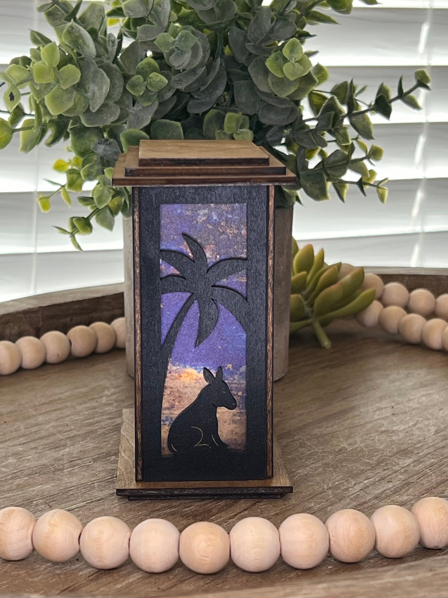 Rustic black and golden oak nativity lantern with LED tea-light candle, perfect for holiday decor, right side, lit view