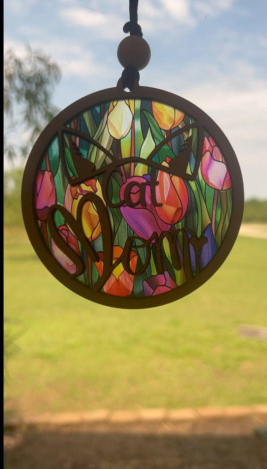 Tulip Cat Mom Suncatcher made of natural wood and multicolor acrylic with stained glass effect lighted.